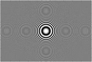 Zone-Plate-Grafik mit konzentrischen Kreisen zur Demonstration von Interferenzeffekten und Skalierungsartefakten bei hochfrequenten Mustern